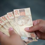 Como fazer o cadastro para o Auxílio Brasil pelo celular? Aprenda como fazer - Reprodução Canva