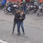 Vítima de assalto leva tiro na cabeça na 25 de Março e fica em estado grave. Imagem: Câmara de Segurança